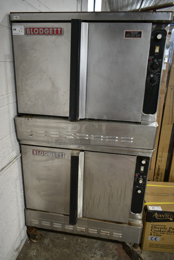 2 Blodgett Stainless Steel Commercial Gas Powered Full Size Convection Ovens w/ Solid Doors and Thermostatic Controls on Commercial Casters. 2 Times Your Bid!