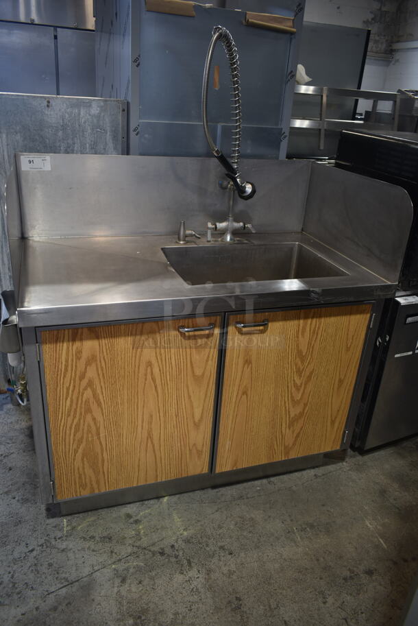 Stainless Steel Commercial Counter w/ Sink Bay, Spray Nozzle Attachment and 2 Wood Pattern Doors.