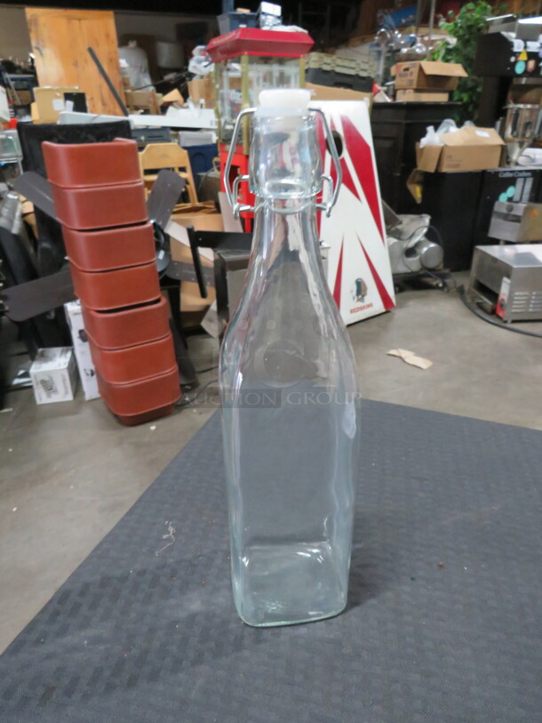 Capped Glass Water Bottle. 2XBID