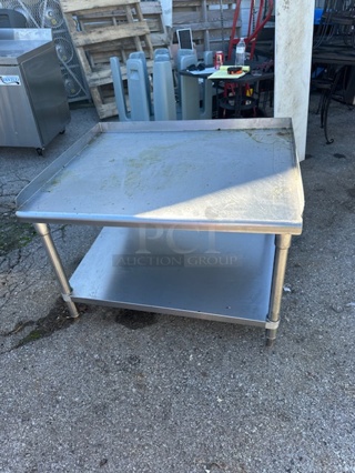 One Stainless Steel Equipment Table With Under Shelf. # FSS-3630. 37X31X27.5.