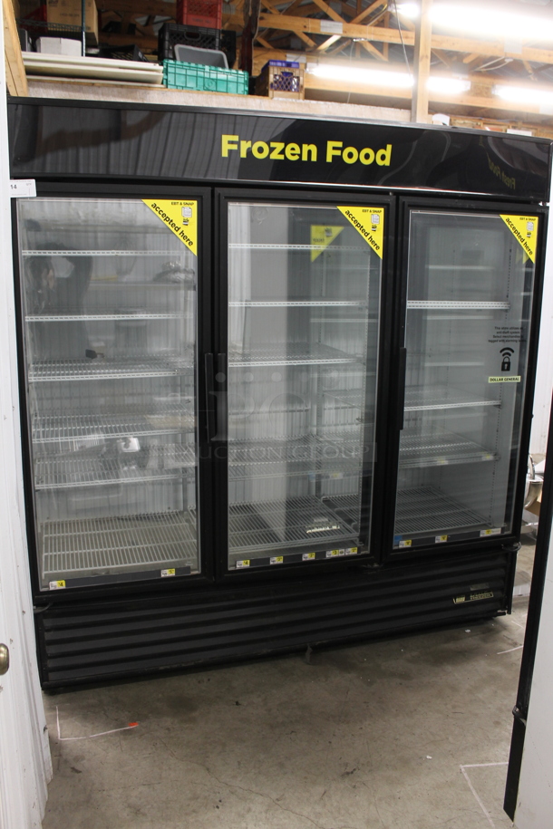 2012 True GDM-72F-LD ENERGY STAR Metal Commercial 3 Door Reach In Freezer Merchandiser w/ Poly Coated Racks. 115/208-230 Volts, 1 Phase. Tested and Working!