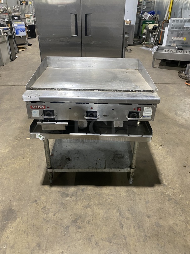 One Vulcan Natural Gas Griddle On A Table With Under Shelf On Casters! Working when Removed! - Item #1128013