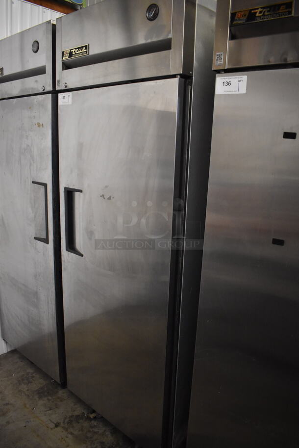 2011 True TG1R-1S Stainless Steel Commercial Single Door Reach In Cooler w/ Poly Coated Racks on Commercial Casters. 115 Volts, 1 Phase. 29x34x82. Tested and Working!