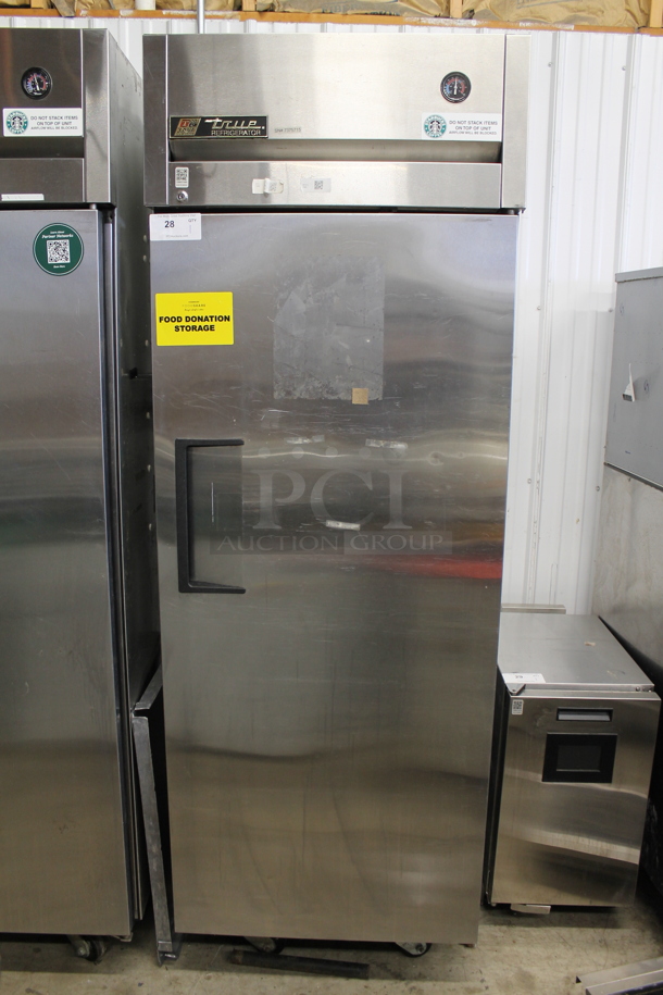 2012 True TG1R-1S ENERGY STAR Stainless Steel Commercial Single Door Reach In Cooler w/ Poly Coated Racks on Commercial Casters. 115 Volts, 1 Phase. Cannot Test Due To Cut Power Cord