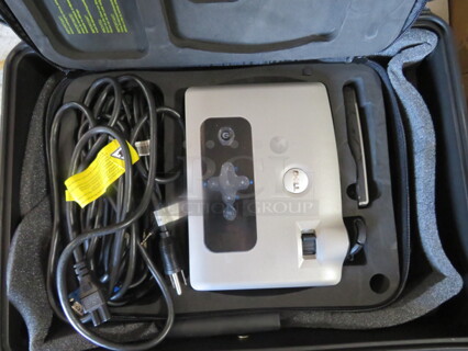 One Dell DLP Front Projector With Remote In A Storm Case, #iM2600. # 3400MP.