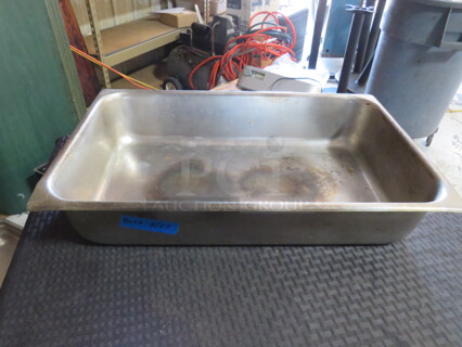 One Full Size 4 Inch Deep Hotel Pan. 