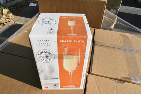 11 BRAND NEW! Boxes Including Bormioli Rocco Spazio Flute Glasses. 11 Times Your Bid! 