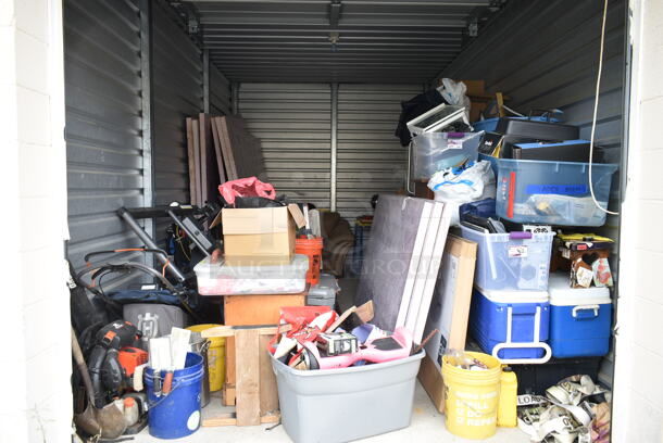 ALL ONE MONEY! Lot of Entire Contents of Storage Unit #32.
Unit Size: 10'x20'. Unit Appears to Contain: Blue and White Poly Portable Coolers, Hoverboard, Foam Panels, Echo PB-8010T Backpack Leaf Blower, Metal Stock Pot, Shovels, Poly Buckets, Couch, Stainless Steel Cooler w/ Freezer, Gun Box, Nikon Rifle Scope, Motorcycle pieces, Table Saw, Milwaukee Tool Boxes and Tools, Innova Inversion Table, Electric Shrub Trimmer, Golf Clubs, Computer Tower, Laptop, Folding Table, Auto Walk Lawn Mower, Oriental Rug, Wheelbarrow, Wooden Dressers, Metal Desk, Snow Blower, Car Radio, DeWalt Saw and various Tools . Cleaning Deposit of $100 per Unit Paid on Pickup Day. Winner Has 7 Days From Close of Auction to Remove Items. All Items Must Be Removed and Unit Must Be Broom Swept to Get Cleaning Deposit Returned. - Item #1126962