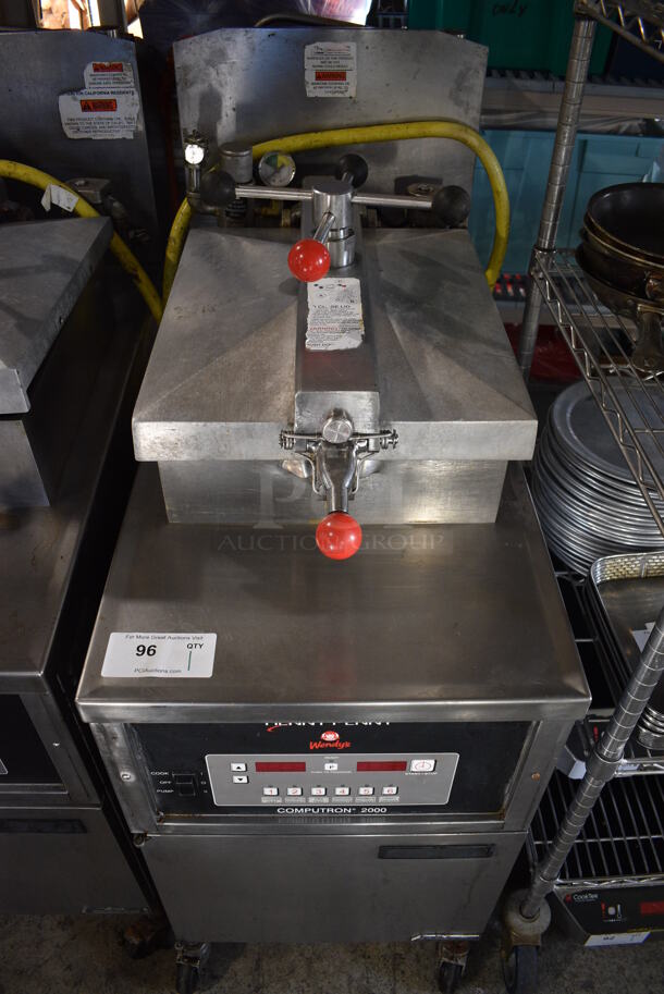 LATE MODEL! Henny Penny 600C Stainless Steel Commercial Floor Style Natural Gas Powered Pressure Fryer on Commercial Casters. 18x39x48