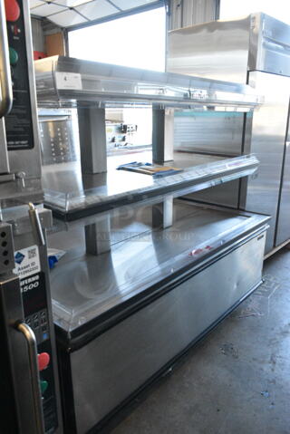 BRAND NEW SCRATCH AND DENT! Custom Deli's Inc DILW-6H Stainless Steel Commercial Floor Style 2 Tier Warming Display Case Merchandiser. 208 Volts, 3 Phase.