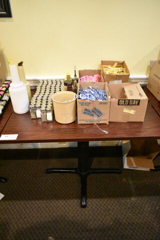 Wood Pattern Dining Height Table w/ Contents Including Sugar Packets, Salt and Pepper Shakers. (main dining room)