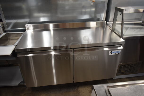 BRAND NEW SCRATCH AND DENT! 2023 Avantco 178SSWT60FHC Stainless Steel Commercial 2 Door Work Top Cooler w/ Back Splash on Commercial Casters. 115 Volts, 1 Phase. Tested and Working!