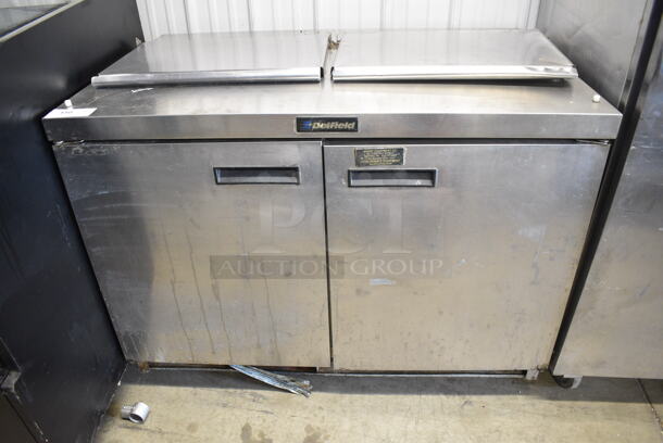 Delfield 4448-12 Stainless Steel Commercial 2 Door Prep Table w/ 2 Lids on Commercial Casters. 115 Volts, 1 Phase. Cannot Test Due To Cut Power Cord