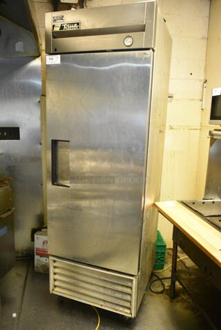 True T-23F Stainless Steel Commercial Single Door Reach In Freezer w/ Poly Coated Racks on Commercial Casters. 115 Volts, 1 Phase. (kitchen)