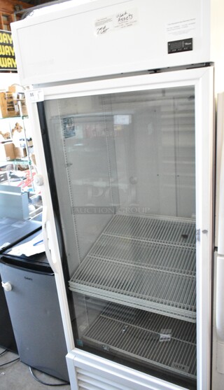 2021 True TSCI-600R-G-PH Metal Commercial Single Door Reach In Cooler Merchandiser w/ Poly Coated Racks. 115 Volts, 1 Phase. Tested and Working!