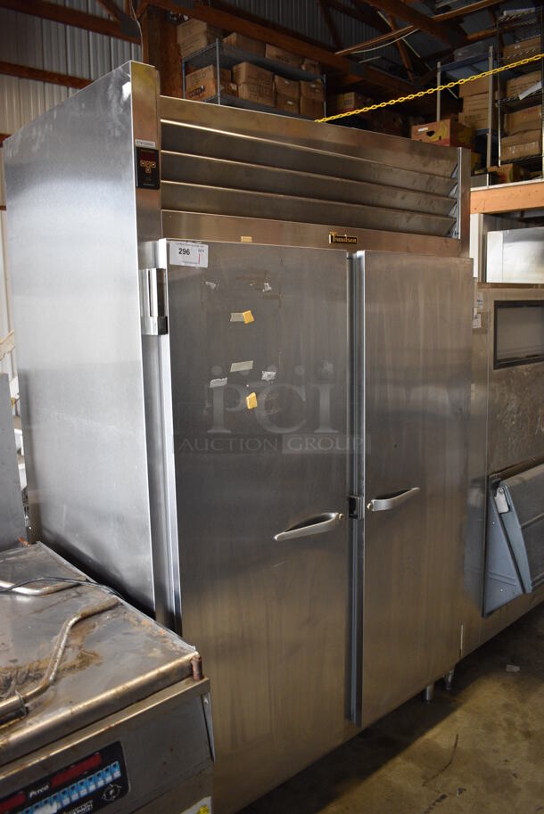 Traulsen Model RHT232NUT-FHS Stainless Steel Commercial 2 Door Reach In Cooler w/ Racks. 115 Volts, 1 Phase. 52x34x83.5. Tested and Powers On But Does Not Get Cold