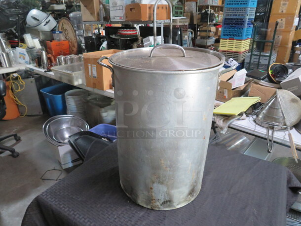 One Aluminum Eastman Outdoors Stock Pot With A Stainless Steel Lid. 12X17