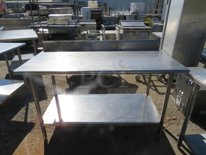 One Stainless Steel Table With Back Splash And SS Under Shelf. 60X30X40