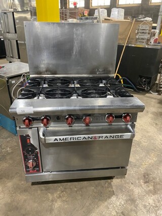 American Range Commercial Natural Gas Powered 6 Burner Stove! With Backsplash! With Full Size Oven Underneath! All Stainless Steel! On Casters!