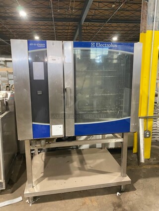 AMAZING! Electrolux Air-O-Steam Touchline Series Natural Gas Powered Combi Oven! All Stainless Steel! With Metal Oven Racks! On Stand With Storage Shelf! 120V 1 Phase! Model: AOS102GTP1 SN: 20404001!