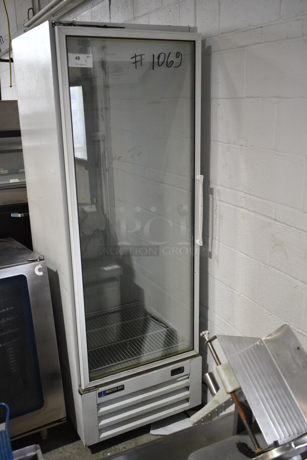 Master-Bilt IM-23-HGP Metal Commercial Single Door Reach In Bagged Ice Merchandiser. 208-230 Volts, 1 Phase. Tested and Powers On But Does Not Get Cold