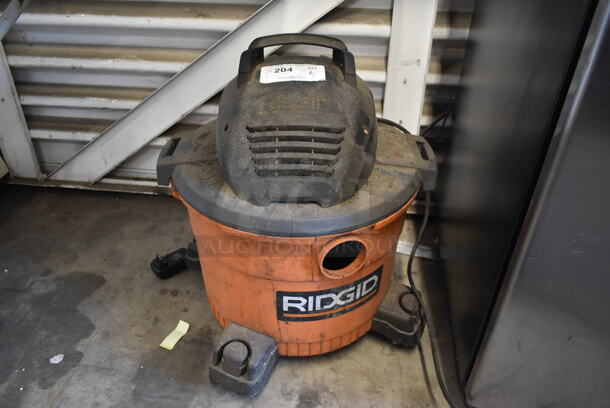 Rigid WD09701 Orange and Black Poly Wet Dry Vac Vacuum Cleaner. 120 Volts, 1 Phase. Tested and Working!