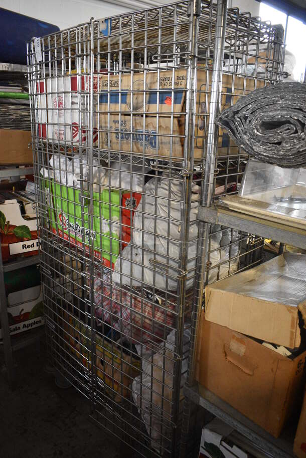 ALL ONE MONEY! Lot of Chrome Finish 4 Tier Shelving Unit on Commercial Casters w/ Liquor Cage and Contents Including Clothing. BUYER MUST DISMANTLE. PCI CANNOT DISMANTLE FOR SHIPPING. PLEASE CONSIDER FREIGHT CHARGES. 38x20x69