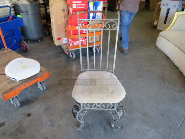 Metal Chair With A Cushioned Seat. 2XBID