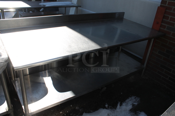 Stainless Steel Commercial Table w/ Back Splash and Under Shelf.