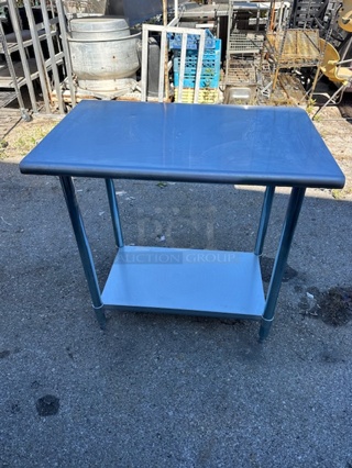 One Stainless Steel Table With Under Shelf. 36X24X35.5