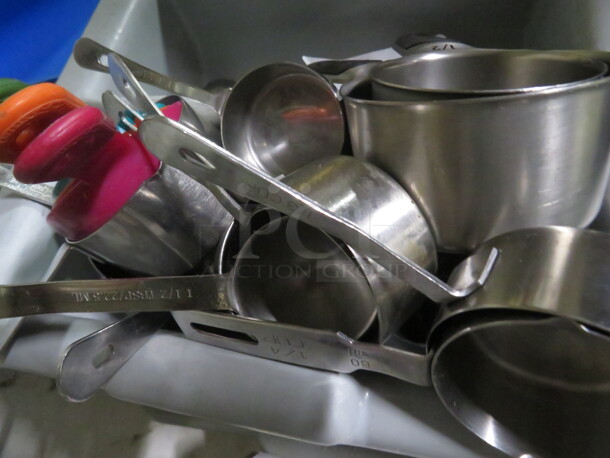 One Lot Of Measuring Cups.