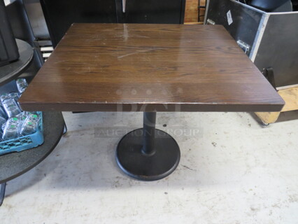 One 1.5 Inch Thick Solid Wood Table On A Pedestal Base. 36X36X30.