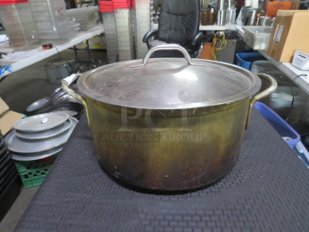 One Aluminum Stock Pot With A Stainless Steel Lid. 14X8