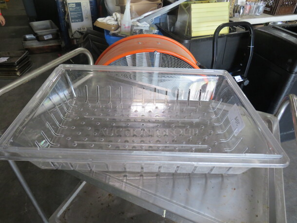 One Carlisle Perforated Food Storage Container. 24X18X6