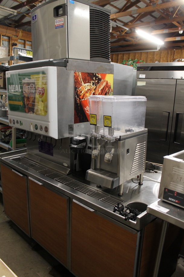 2022 Manitowoc IYT0420W-161 Ice Head on Cornelius ED250-BCZ 8 Flavor Carbonated Beverage Machine and Duke SUBBD-72-LM Stainless Steel Soda Station. 115 Volts, 1 Phase. Does Not Come w/ Keurig or Crathco Drink Dispenser Seen In Pictures.