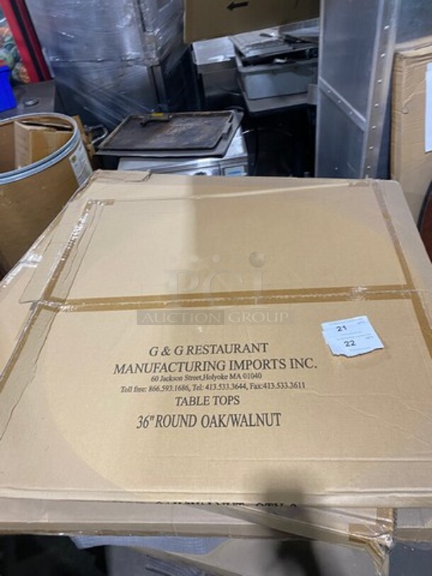 IN THE BOX! G & G Commercial 36" Round Oak/ Walnut Tabletops! With Metal Base! EACH LOT MAY HAVE DIFFERENT STYLE METAL BASE! EACH BOX HAS 2 TABLETOPS! 1 BOX PER LOT NUMBER! 2x Your Bid!