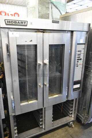 Hobart Stainless Steel Commercial Electric Powered Mini Rotating Rack Oven w/ Lower Double Pan Rack on Commercial Casters. 240 Volts, 3 Phase.