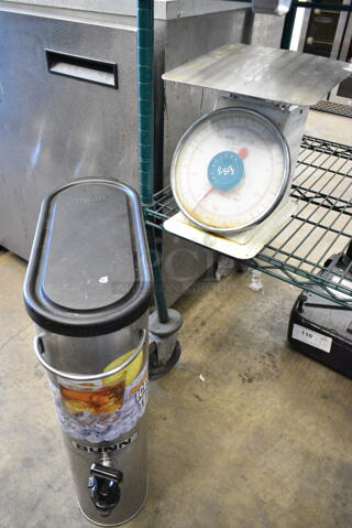 2 Items Including Countertop Scale and Bunn Stainless Steel Iced Tea Holder Dispenser. 2 Times Your Bid! 