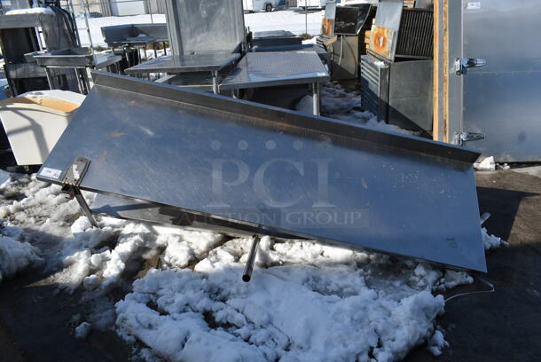 Stainless Steel Commercial Table w/ Under Shelf and Commercial Can Opener Mount. Missing 2 Legs.