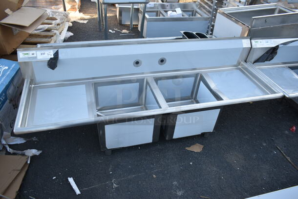 BRAND NEW SCRATCH AND DENT! Regency 600S21717218 Stainless Steel 2 Bay Sink w/ Dual Drain Boards. No Legs. Bays 17x17. Drain Boards 16.5x19.