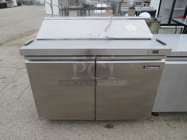 One Blueline Tech Stainless Steel 2 Door Refrigerated Prep Table With 2 Racks, On Casters. Model# BSU48RS. 115 Volt. 48X30X45