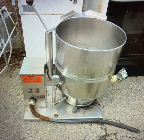 One Groen Stainless Steel Steam Jacketed Tilt Kettle.