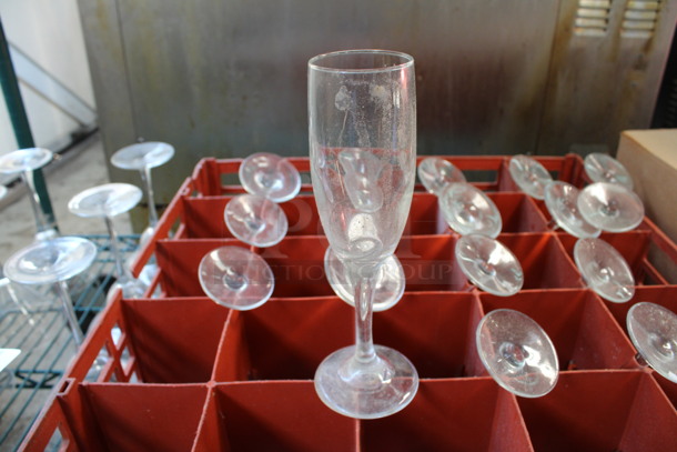 19 Champagne Glasses in Dish Caddy. 2.5x2.5x8. 19 Times Your Bid!