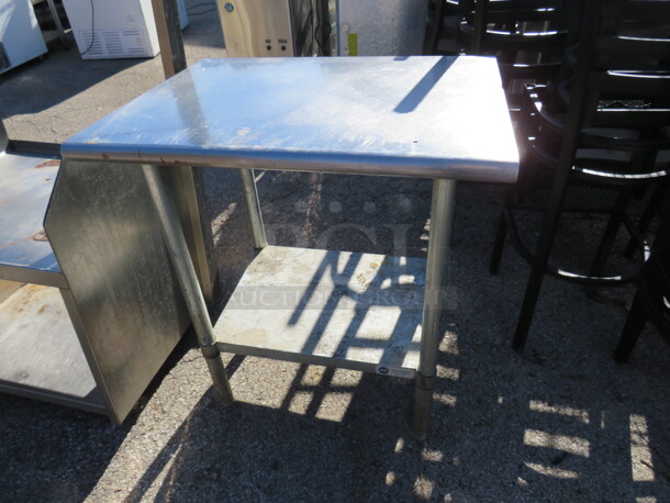 One Stainless Steel Table With Under Shelf. 30X24X36