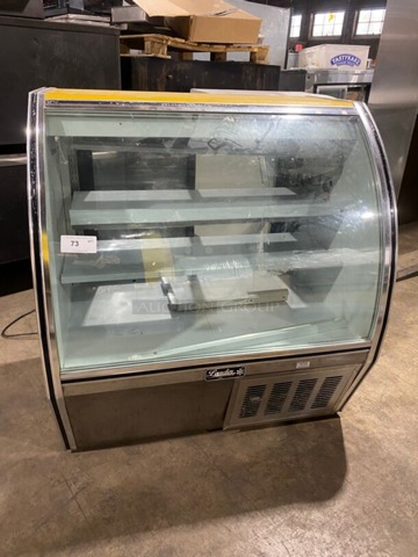 2010 Leader Commercial Refrigerated Bakery Display Case Merchandiser! With Curved Front Glass! With Rear Access Doors! Stainless Steel Body! Model: RHDL48 SN: PT10M1682D 115V 60HZ 1 Phase