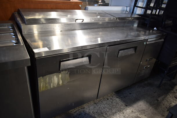 Titan SPECH-CA Stainless Steel Commercial Pizza Prep Table on Commercial Casters. 115 Volts, 1 Phase. Tested and Powers On But Does Not Get Cold