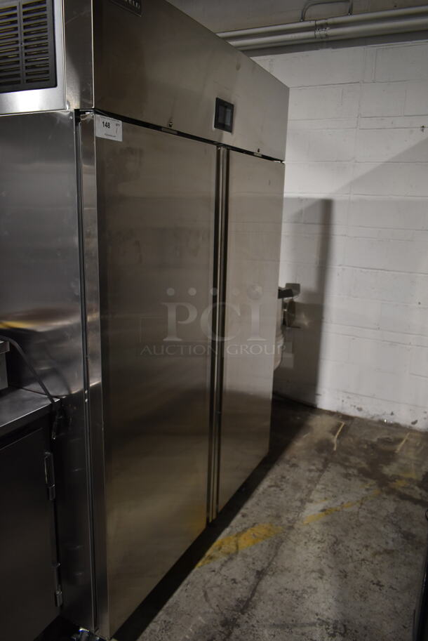 BRAND NEW SCRATCH AND DENT! 2022 Delfield GAHPT2-S Stainless Steel Commercial 2 Door Reach In Pass Through Warmer w/ Poly Coated Racks on Commercial Casters. 115 Volts, 1 Phase. Tested and Working!
