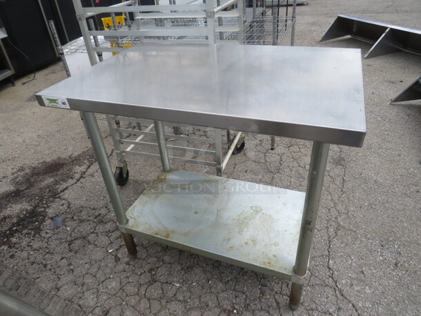One Stainless Steel Table With Under Shelf. 36X24X34