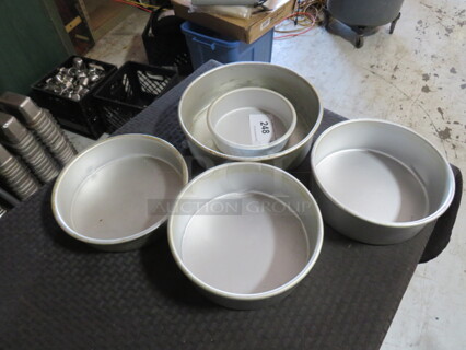 One Lot Of Assorted Cake Pans.