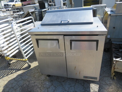 One True 2 Door Refrigerated Prep Table With 1 Rack On Casters. Model# TSSU-36-08. 115 Volt. 36X30X44. $4210-85.